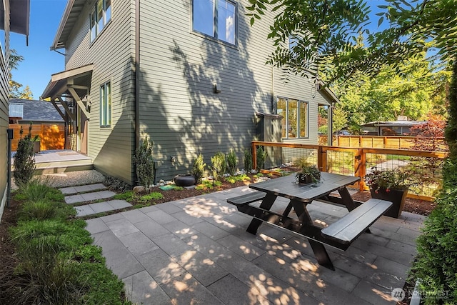 10419 41st Ave SW Unit A, Seattle, WA 98146 - view of patio / terrace with outdoor dining area and fence
