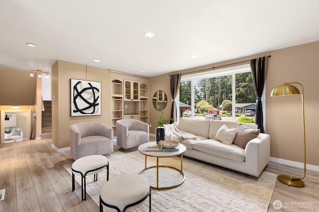 13832 146th Pl SE, Renton, WA 98059 - living area featuring light wood-type flooring, baseboards, stairs, and recessed lighting