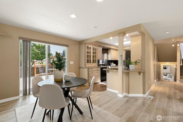 13832 146th Pl SE, Renton, WA 98059 - dining area with light wood-style floors, baseboards, and recessed lighting