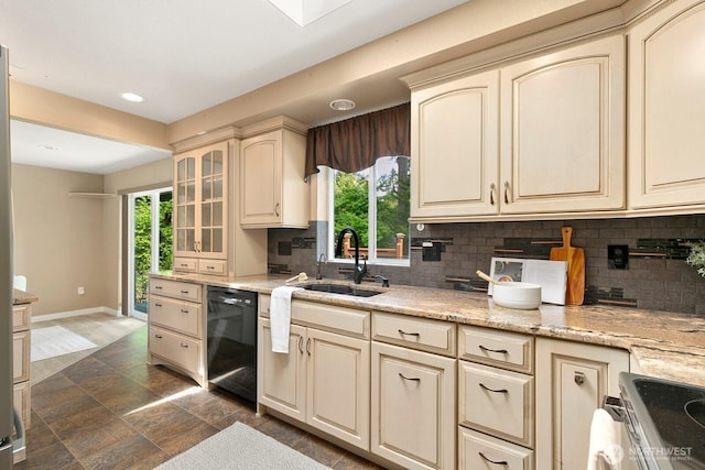 13832 146th Pl SE, Renton, WA 98059 - kitchen with cream cabinets, a sink, dishwasher, baseboards, and recessed lighting
