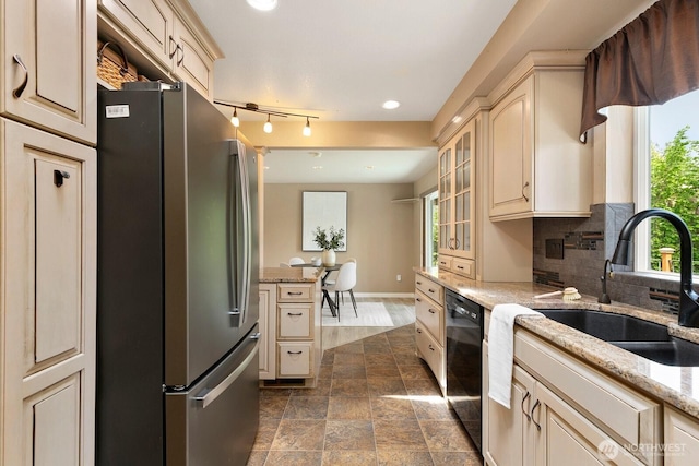 13832 146th Pl SE, Renton, WA 98059 - kitchen featuring freestanding refrigerator, cream cabinets, a sink, dishwasher, and tasteful backsplash