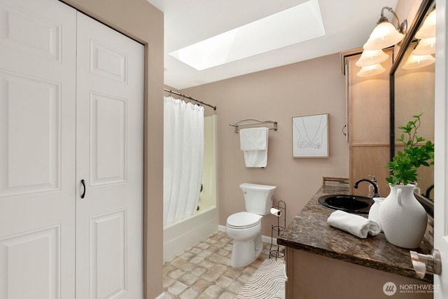 13832 146th Pl SE, Renton, WA 98059 - bathroom with a skylight, toilet, baseboards, vanity, and shower / bath combination with curtain