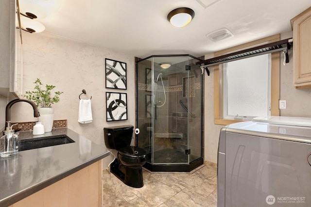 13832 146th Pl SE, Renton, WA 98059 - full bath with washer / clothes dryer, a shower stall, and vanity