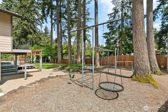 13832 146th Pl SE, Renton, WA 98059 - view of jungle gym with a fenced backyard and a patio
