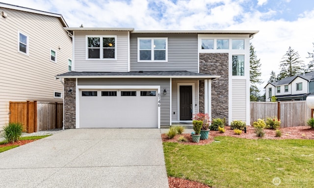 6146 Windlass Ave SE, Port Orchard, WA 98367 - view of front of house with stone siding, driveway, and a garage