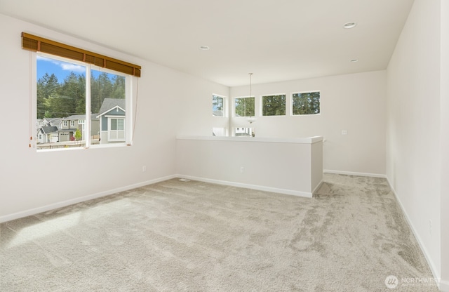 6146 Windlass Ave SE, Port Orchard, WA 98367 - unfurnished room featuring carpet, baseboards, and recessed lighting