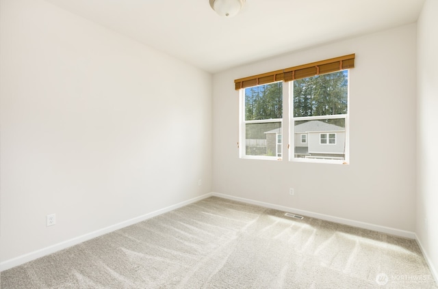 6146 Windlass Ave SE, Port Orchard, WA 98367 - unfurnished room featuring light colored carpet and baseboards
