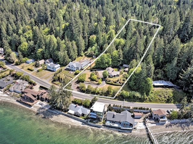 8820 E State Route 106, Union, WA 98592 - aerial perspective of suburban area featuring property parcel outlined and a heavily wooded area