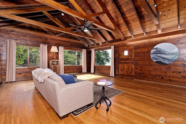 8820 E State Route 106, Union, WA 98592 - living room with wooden walls, wood ceiling, light wood finished floors, and a ceiling fan