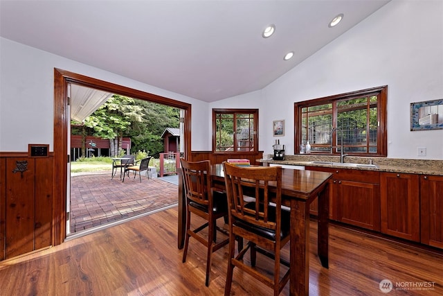 8820 E State Route 106, Union, WA 98592 - dining room featuring dark wood-type flooring, lofted ceiling, a wainscoted wall, and recessed lighting