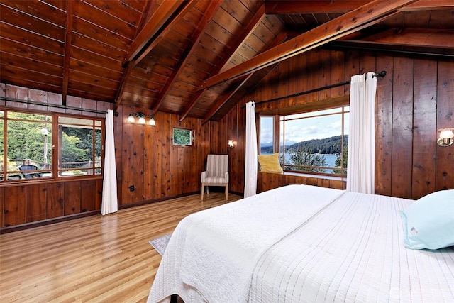 8820 E State Route 106, Union, WA 98592 - bedroom featuring wood finished floors, wood ceiling, wooden walls, and a mountain view
