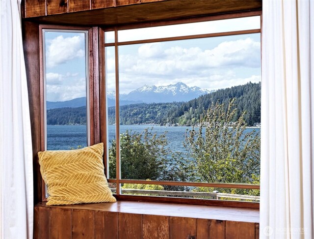 8820 E State Route 106, Union, WA 98592 - interior space with a water and mountain view and a wooded view