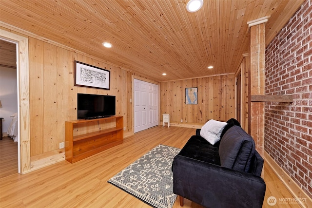 8820 E State Route 106, Union, WA 98592 - living area with wooden ceiling, wood finished floors, wood walls, and recessed lighting