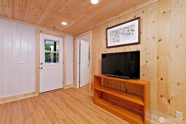 8820 E State Route 106, Union, WA 98592 - foyer entrance with wooden walls, wooden ceiling, wood finished floors, and recessed lighting