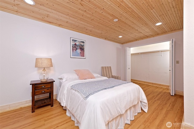 8820 E State Route 106, Union, WA 98592 - bedroom with wooden ceiling, a closet, recessed lighting, and wood finished floors