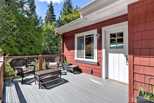8820 E State Route 106, Union, WA 98592 - wooden terrace with outdoor lounge area