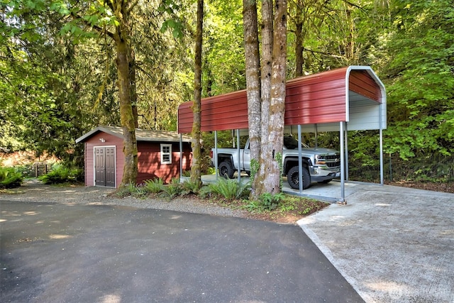 8820 E State Route 106, Union, WA 98592 - view of vehicle parking with driveway and a detached carport