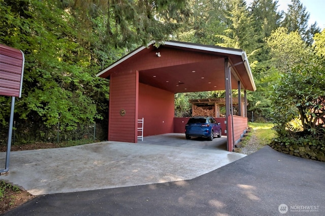 8820 E State Route 106, Union, WA 98592 - garage featuring driveway and a carport