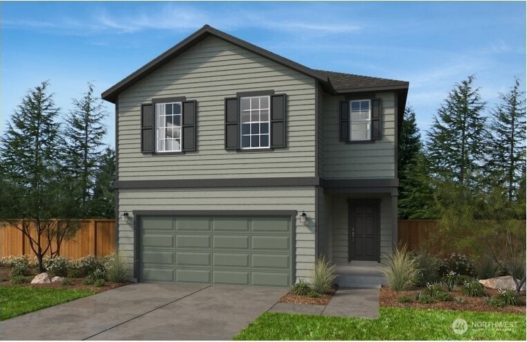 788 Holly Ave Unit 42, Buckley, WA 98321 - view of front of house featuring an attached garage and concrete driveway