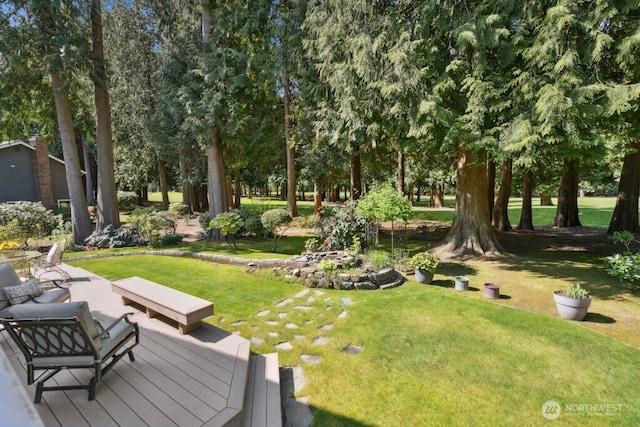 21010 NE 33rd Pl, Sammamish, WA 98074 - view of grassy yard with a deck