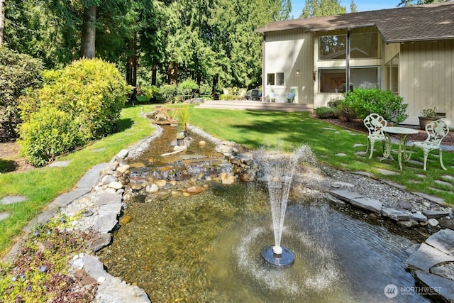 21010 NE 33rd Pl, Sammamish, WA 98074 - view of green lawn featuring a small pond
