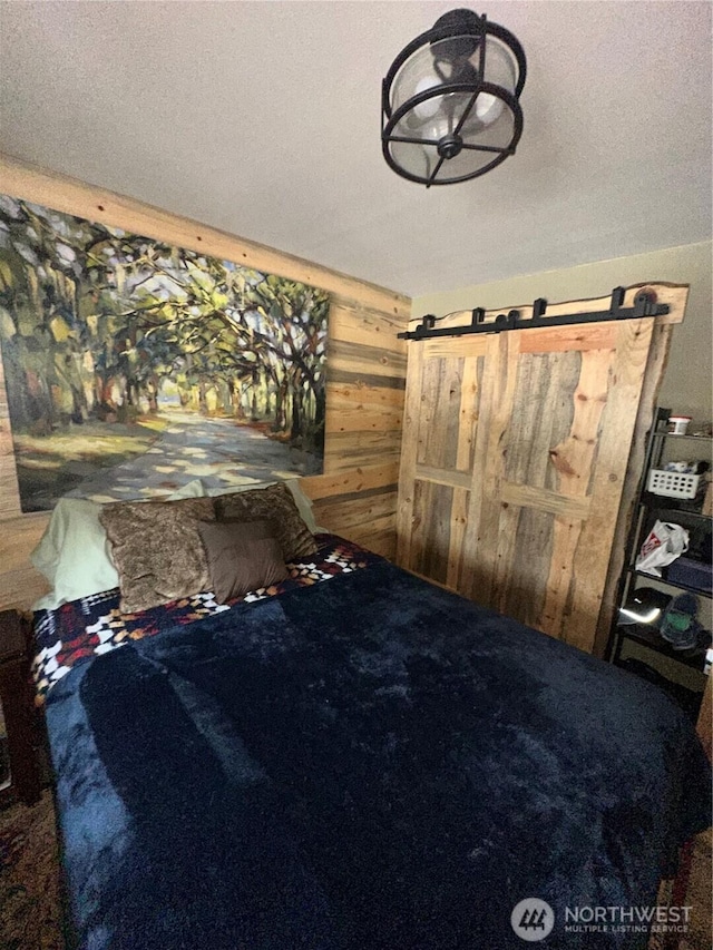 22415 Stirrup Rd, Leavenworth, WA 98826 - carpeted bedroom featuring wood walls