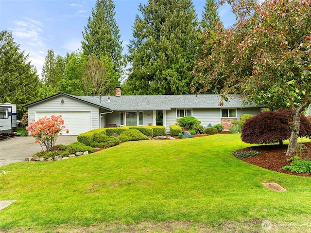 5102 23rd Ave SE, Lacey, WA 98503 - ranch-style home featuring asphalt driveway, a garage, a chimney, and a front yard