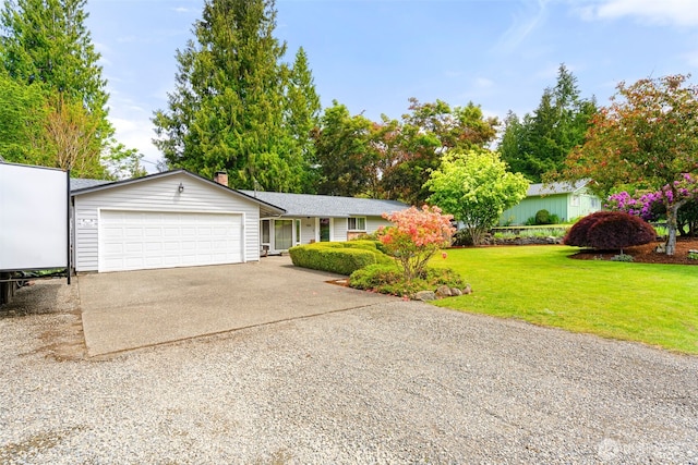 5102 23rd Ave SE, Lacey, WA 98503 - view of front of property with a garage, concrete driveway, and a front yard