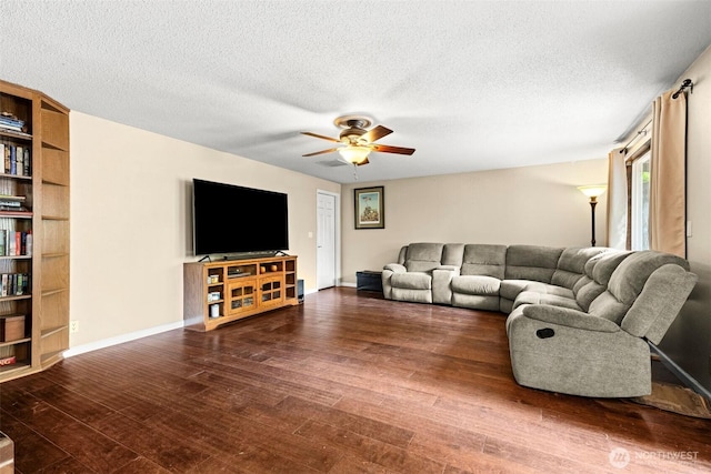 5102 23rd Ave SE, Lacey, WA 98503 - living area featuring ceiling fan, a textured ceiling, wood finished floors, and baseboards