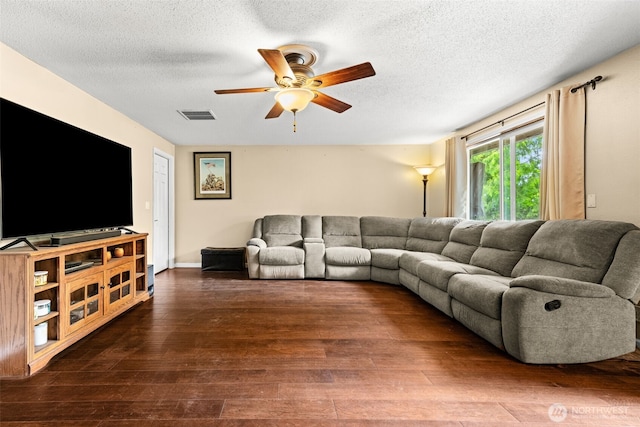 5102 23rd Ave SE, Lacey, WA 98503 - living room with ceiling fan, wood-type flooring, and a textured ceiling