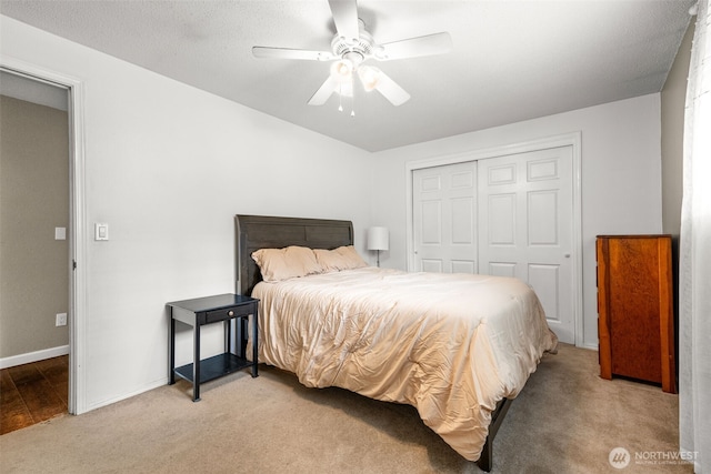 5102 23rd Ave SE, Lacey, WA 98503 - bedroom featuring light colored carpet, a closet, a ceiling fan, and baseboards