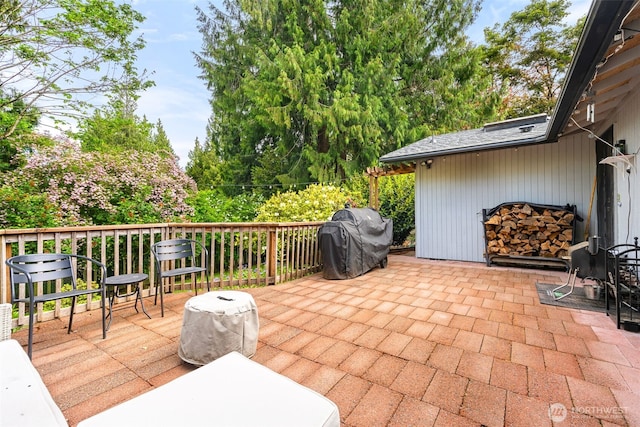 5102 23rd Ave SE, Lacey, WA 98503 - wooden deck with a grill and a patio area