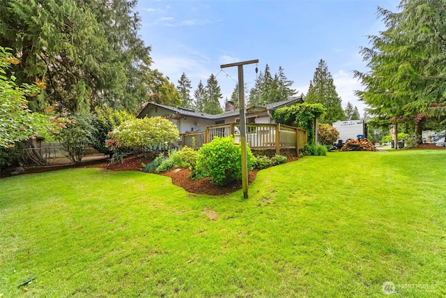 5102 23rd Ave SE, Lacey, WA 98503 - view of grassy yard with a deck