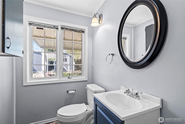 12608 SE Mcgillivray Blvd, Vancouver, WA 98683 - bathroom with healthy amount of natural light, toilet, ornamental molding, and vanity