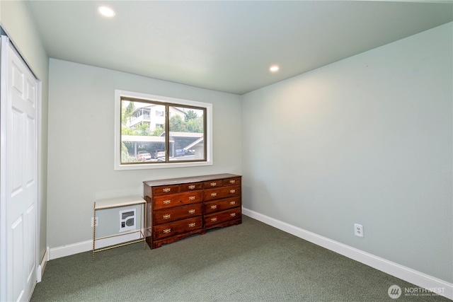 bedroom featuring dark colored carpet, recessed lighting, a closet, and baseboards