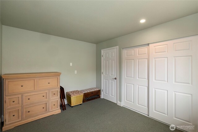 bedroom featuring dark carpet and recessed lighting