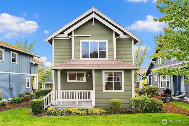 1748 25th Walk NE, Issaquah, WA 98029 - rear view of property with a lawn, a porch, and a shingled roof