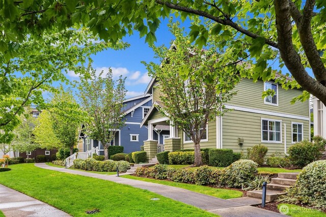 1748 25th Walk NE, Issaquah, WA 98029 - view of property hidden behind natural elements with a front yard