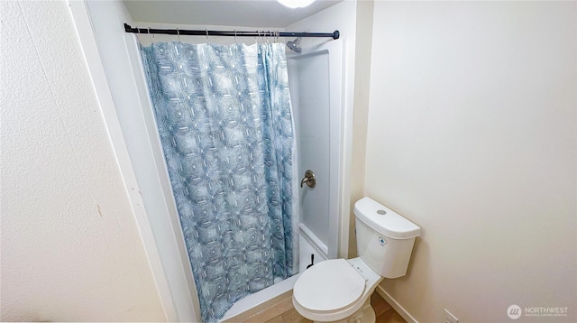 3333 228th St SE Unit 119, Bothell, WA 98021 - bathroom featuring curtained shower and toilet