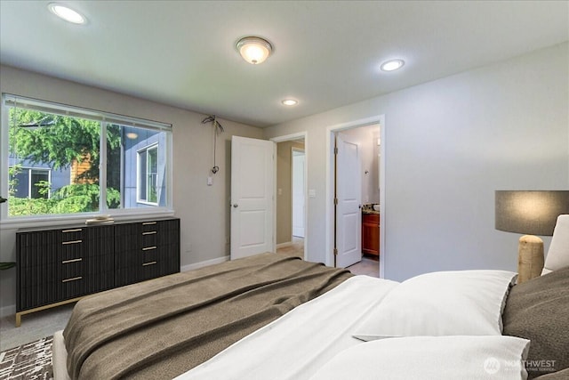 10826 NE 148th Ln Unit H201, Bothell, WA 98011 - bedroom with recessed lighting, baseboards, and light carpet