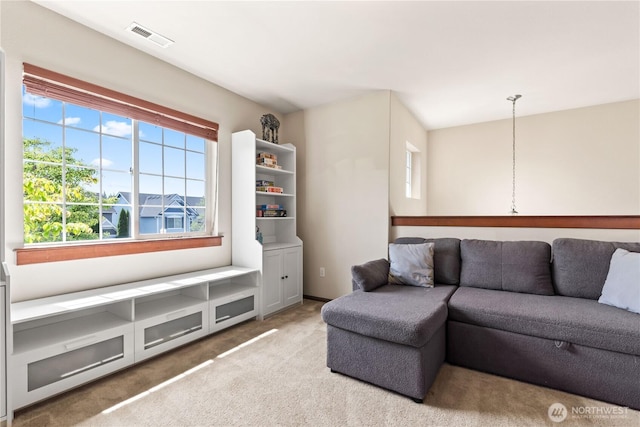 living area with carpet flooring