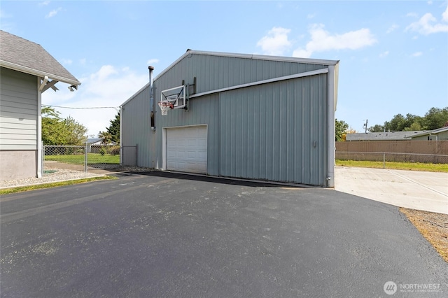 256 S C St, Buckley, WA 98321 - detached garage with fence and asphalt driveway