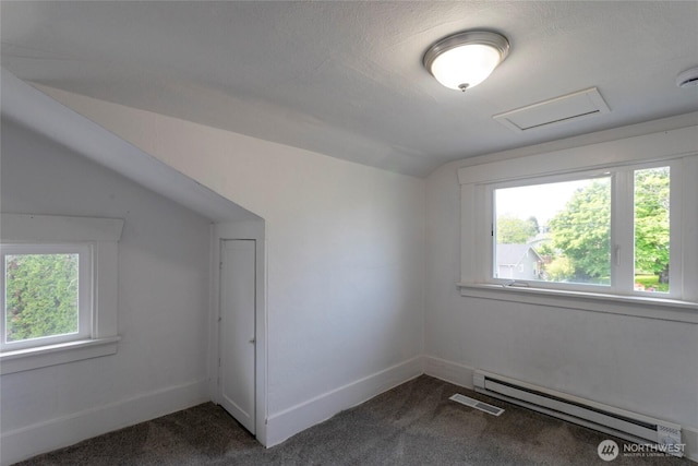 6835 S I St, Tacoma, WA 98408 - bonus room featuring a baseboard heating unit, dark colored carpet, lofted ceiling, attic access, and baseboards
