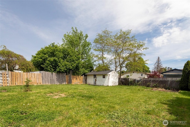 6835 S I St, Tacoma, WA 98408 - view of yard featuring a storage shed and an outdoor structure
