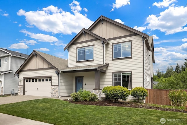 craftsman-style home featuring board and batten siding, driveway, an attached garage, and roof with shingles