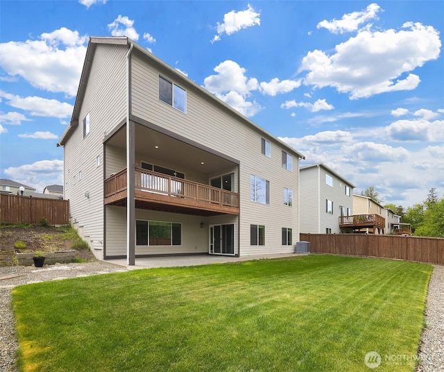 back of property with a patio area and central AC unit