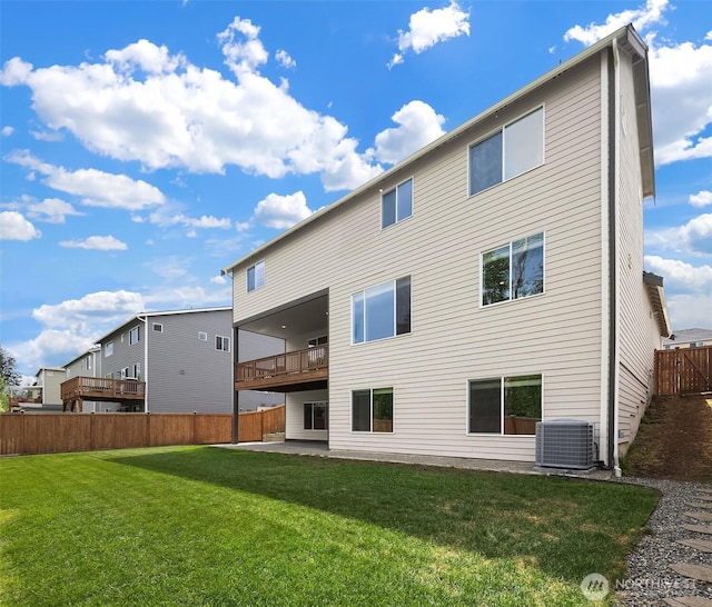 rear view of property featuring central AC, a balcony, and a patio area