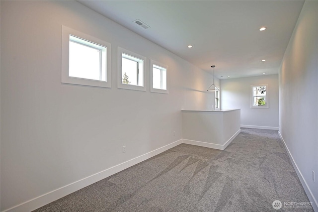 1458 Larkspur Ln, Camano Island, WA 98282 - unfurnished room featuring baseboards, dark carpet, and recessed lighting