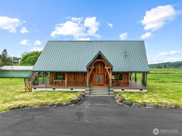6238 Willow Grove Rd, Longview, WA 98632 - view of front of home with crawl space, a porch, metal roof, and a front lawn