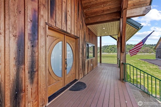 6238 Willow Grove Rd, Longview, WA 98632 - wooden deck featuring covered porch and a lawn